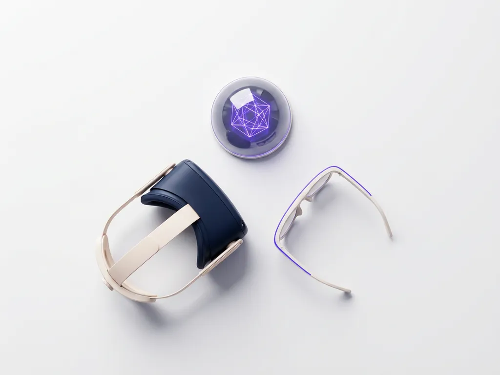 VR headset, AR glasses, and holographic dome arranged in a triangle on white surface with midnight blue and electric violet tones.